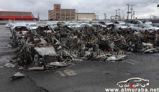 غرق وحريق اكثر من 16 سيارة "فيسكر كارما" الجديدة إثر إعصار ساندي بميناء نيو جيرسي بالصور 4